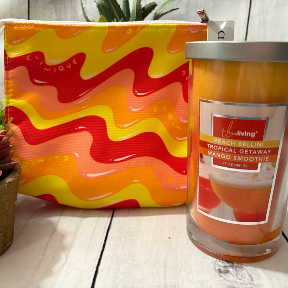 Clinique makeup bag (NWT) and True Living Candle (new)